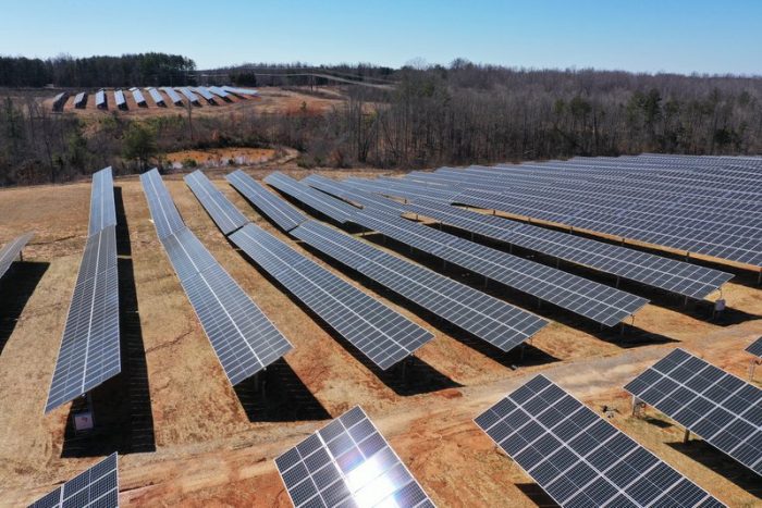 How solar trackers overcome undulating terrain and avoid grading