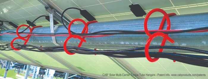 https://solarbuildermag.com/wp-content/uploads/2022/02/CAB-Solar-Multi-Carrier-Torque-Tube-Hangers-700x266.jpg