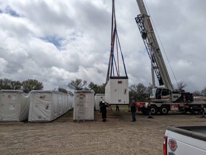 Battery lifted by crane BESS decommissioning
